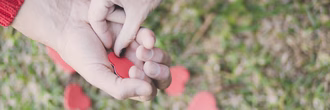 unrecognizable-couple-holding-paper-hearts (1)
